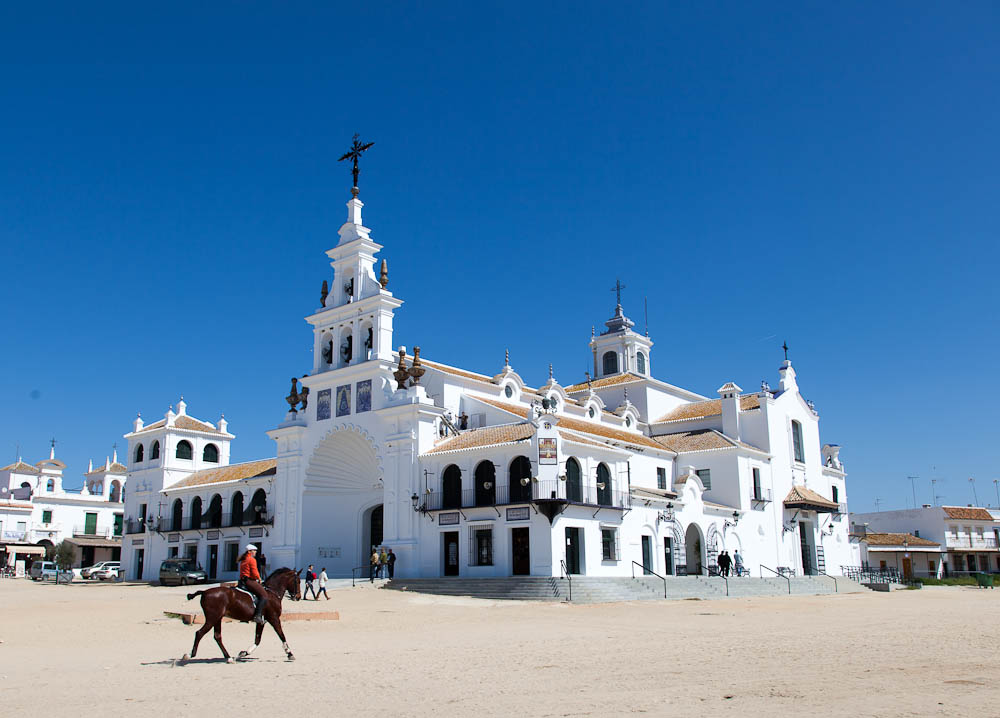 Horse Rider In Front Of Cathedral